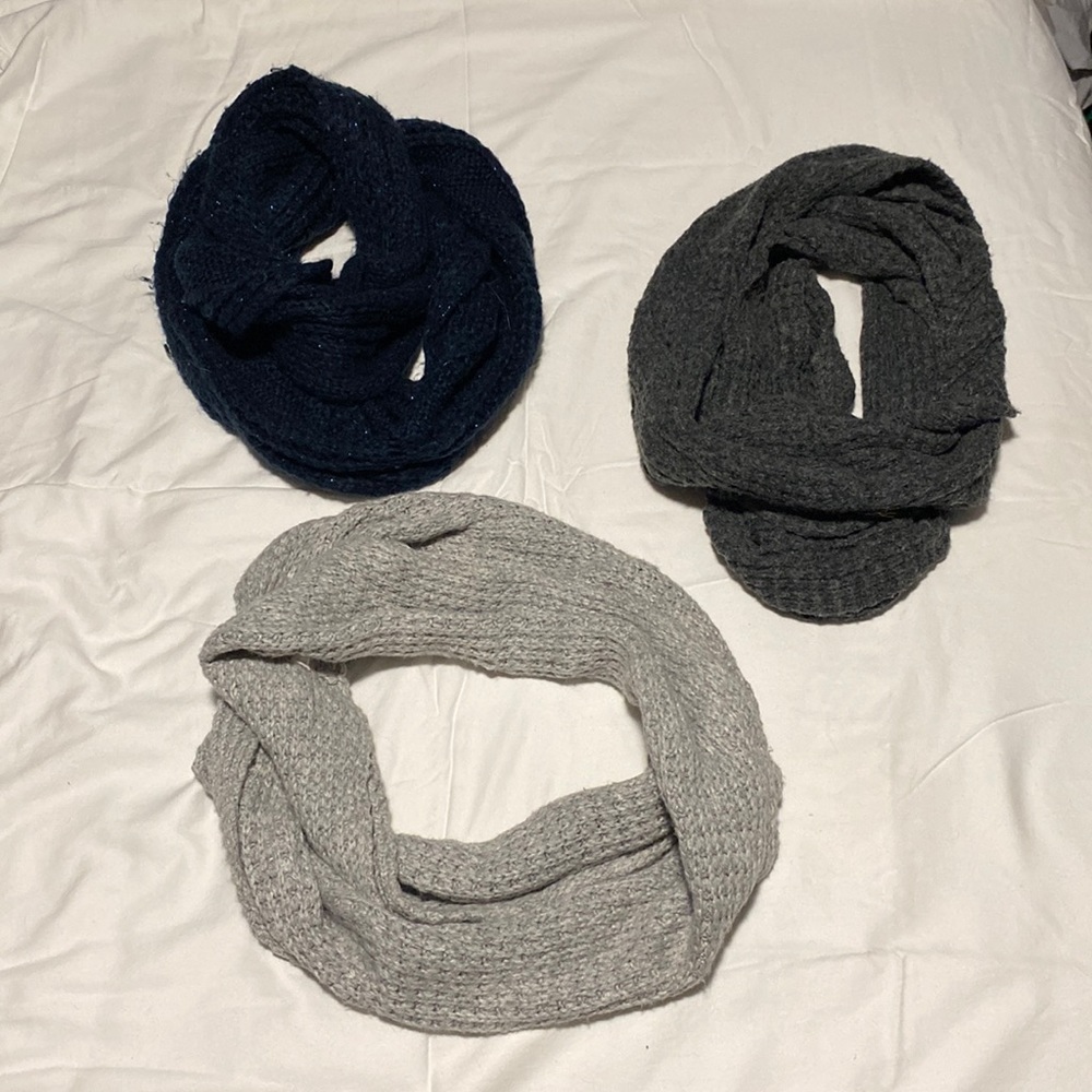 Three infinity scarves, soft knitted material